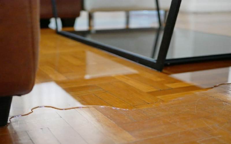 fix warped wood floor water damage