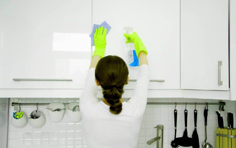 how to clean sticky wood kitchen cabinets